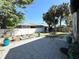Backyard featuring a patio, privacy fence, and various plants and greenery at 3025 W North A St, Tampa, FL 33609