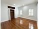 Unfurnished bedroom with closet, hardwood floors, fresh paint and lots of natural light at 3025 W North A St, Tampa, FL 33609