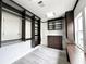 Well-organized walk-in closet with custom shelving, drawers, and stylish lighting, perfect for storage at 3025 W North A St, Tampa, FL 33609