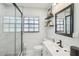 Clean bathroom featuring a tiled shower, sleek fixtures, and bright natural light at 4335 S Coolidge Ave, Tampa, FL 33611