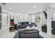 Well-lit living room with modern furnishings and decorative wall art at 4335 S Coolidge Ave, Tampa, FL 33611