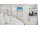 Comfortable bedroom featuring a large bed, ample closet space, and a flat screen television at 4335 S Coolidge Ave, Tampa, FL 33611