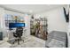 Bright office space featuring a desk setup, shelving, and ample storage, perfect for a productive workspace at 4335 S Coolidge Ave, Tampa, FL 33611