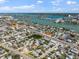 Breathtaking aerial view of a coastal community with diverse architecture and stunning water views, highlighting the neighborhood's charm at 437 79Th Ave, St Pete Beach, FL 33706