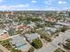 Attractive aerial view of a residential neighborhood, showcasing well-maintained homes and lush landscaping under a sunny sky at 437 79Th Ave, St Pete Beach, FL 33706