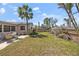 Landscaped backyard featuring a patio area perfect for outdoor dining and entertaining at 437 79Th Ave, St Pete Beach, FL 33706