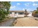 Charming single-story home featuring a well-maintained exterior and a cozy front yard at 437 79Th Ave, St Pete Beach, FL 33706
