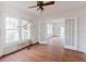 Living room with hardwood floors, many windows, and doors leading to other rooms at 8226 36Th N Ave, St Petersburg, FL 33710