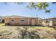 Home exterior features a partially fenced backyard at 3720 E Idlewild Ave, Tampa, FL 33610