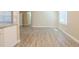 Bright living area flowing seamlessly to the kitchen and dining space at 3720 E Idlewild Ave, Tampa, FL 33610