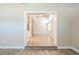 Open-concept living space connecting to a renovated kitchen with modern finishes at 3720 E Idlewild Ave, Tampa, FL 33610