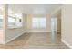 Spacious living area, open to a modern kitchen, with great natural light at 3720 E Idlewild Ave, Tampa, FL 33610