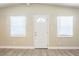 Inviting living room with ample natural light and new wood-look flooring at 3720 E Idlewild Ave, Tampa, FL 33610