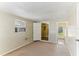 This bedroom features a window AC unit and 2 open doorways at 4046 Las Vegas Dr, New Port Richey, FL 34653