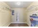 Spacious walk-in closet with wooden floors, wire racks, and access to the water heater at 4046 Las Vegas Dr, New Port Richey, FL 34653
