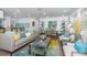 Bright and airy open-concept living room with modern furniture and stylish décor at 1825 Alberta Dr, Clearwater, FL 33756