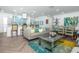 Stylish open-concept living and dining area, showcasing the seamless design and modern decor at 1825 Alberta Dr, Clearwater, FL 33756