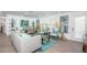 Inviting living room with modern decor, stylish furniture, and ample natural light at 1825 Alberta Dr, Clearwater, FL 33756