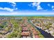 Wide aerial shot of condo community, serene lakes, and lush landscaping with clear skies in the background at 5729 Baywater Dr # 5729, Tampa, FL 33615