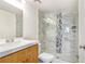 Bathroom with modern vanity, toilet, and glass shower at 5729 Baywater Dr # 5729, Tampa, FL 33615