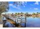 Waterfront property featuring a private boat dock with beautiful water views at 5729 Baywater Dr # 5729, Tampa, FL 33615