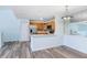 Bright kitchen featuring stainless steel appliances, wood cabinets, and a stylish backsplash at 5729 Baywater Dr # 5729, Tampa, FL 33615