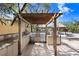 Outdoor kitchen including stainless steel grills and ample counter space, ideal for gatherings at 5729 Baywater Dr # 5729, Tampa, FL 33615