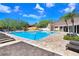 Relaxing pool with plenty of lounge chairs and a stunning blue sky overhead at 5729 Baywater Dr # 5729, Tampa, FL 33615