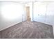 Bedroom with neutral carpet and multiple closets, offering ample storage space at 11856 Throttle Pl, Gibsonton, FL 33534
