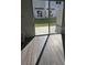 Sliding glass doors open to a patio, providing natural light and seamless indoor-outdoor living at 11856 Throttle Pl, Gibsonton, FL 33534