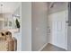 Bright foyer featuring tiled flooring and a view of the dining area at 669 Lakemont Dr, Brandon, FL 33510