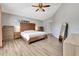 Spacious bedroom with vaulted ceilings, wood-look floors, and soft, neutral colors at 669 Lakemont Dr, Brandon, FL 33510