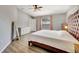 Bedroom featuring wood-look floors, and a ceiling fan at 669 Lakemont Dr, Brandon, FL 33510