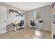 Functional office space with two desks, natural light, and tiled flooring at 669 Lakemont Dr, Brandon, FL 33510