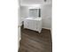 Well-lit bathroom vanity with a large mirror and ample storage space at 4800 86Th N Ave, Pinellas Park, FL 33782