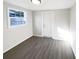 Bright bedroom featuring a window and door to the exterior at 4800 86Th N Ave, Pinellas Park, FL 33782