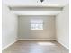 Bedroom with neutral walls, laminate floors, single window, and ceiling fan at 545 Frandor Pl, Apollo Beach, FL 33572