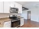 Kitchen with granite countertops, stainless steel appliances, and tile backsplash at 545 Frandor Pl, Apollo Beach, FL 33572