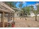 Backyard with play set and mature trees at 3307 W Ballast Point Blvd, Tampa, FL 33611