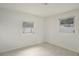 Empty bedroom with tile floors and natural light at 3307 W Ballast Point Blvd, Tampa, FL 33611