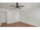 Simple bedroom with wood-look flooring and a ceiling fan for added comfort at 3307 W Ballast Point Blvd, Tampa, FL 33611