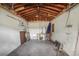 Unfinished garage featuring exposed beams and open space at 3307 W Ballast Point Blvd, Tampa, FL 33611