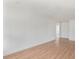 Spacious living room featuring modern paint, recessed lighting, and stylish light wood-look flooring at 3307 W Ballast Point Blvd, Tampa, FL 33611