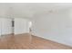 Spacious living room with white walls, hardwood floors, and recessed lighting at 3307 W Ballast Point Blvd, Tampa, FL 33611