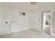 Unfurnished room with tile floors and an access door at 3307 W Ballast Point Blvd, Tampa, FL 33611