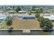 Aerial view of the waterfront property with access to the canal at 149 Roselle Ct, Port Charlotte, FL 33952
