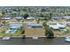 Aerial shot of waterfront homes with private docks and boat access at 149 Roselle Ct, Port Charlotte, FL 33952