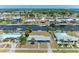 Aerial view of the waterfront community and canal front yard at 149 Roselle Ct, Port Charlotte, FL 33952
