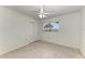 Bright bedroom with ceiling fan and window at 149 Roselle Ct, Port Charlotte, FL 33952