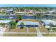 Straight-on view of the front exterior showcasing the yard and roof at 149 Roselle Ct, Port Charlotte, FL 33952